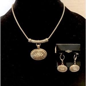 Silver pendant with rhinestones and matching earrings.Stunning!!